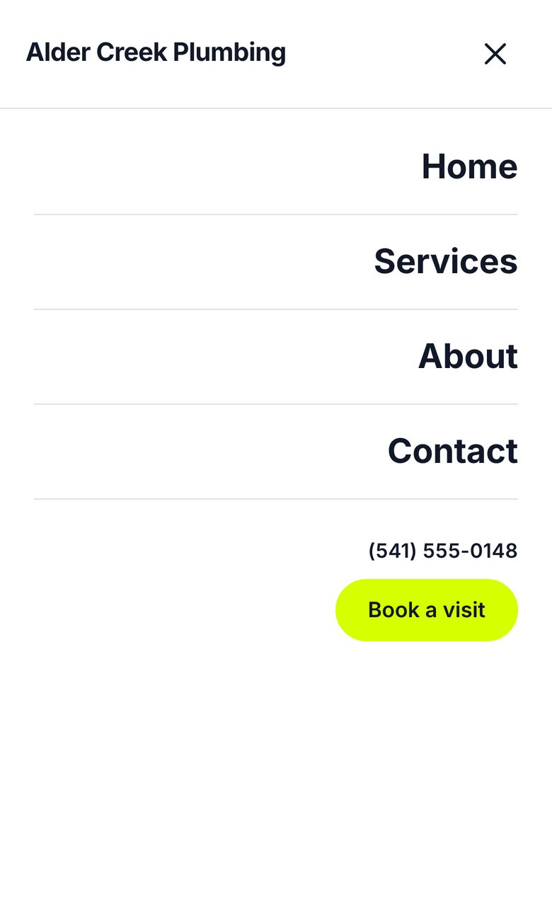 The Studio phone menu open: a full-width sheet under the header, with the links, phone number and button